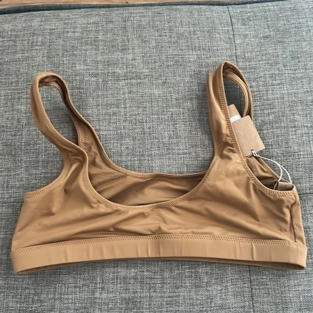 SKIMS swim tank
